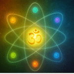 Golden Om at center of atom mandala with six chakra-colored electrons, fusing spirit and science.